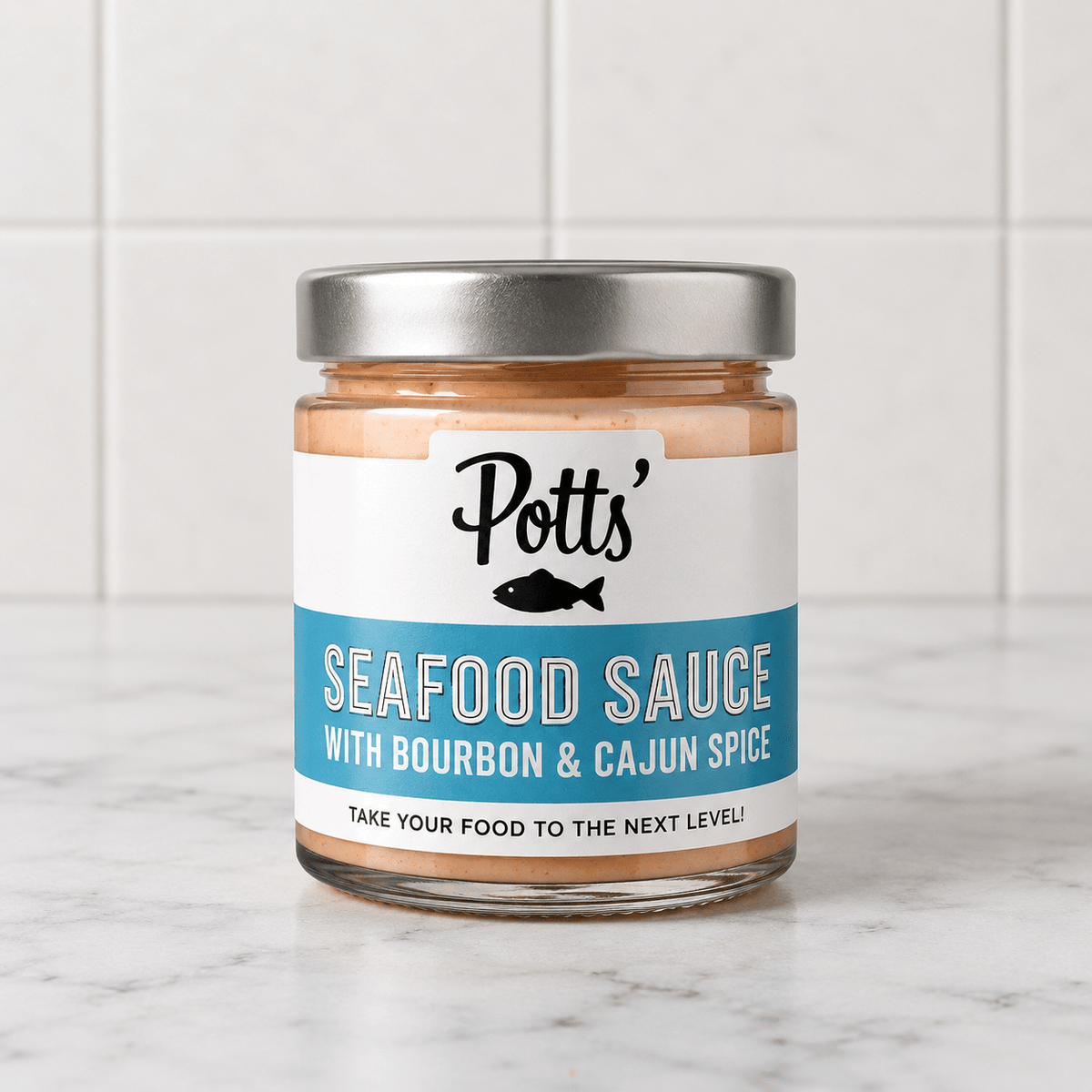 Seafood Sauce with Bourbon & Cajun Spice (180g) on a slate background, from Hamiltons Fish