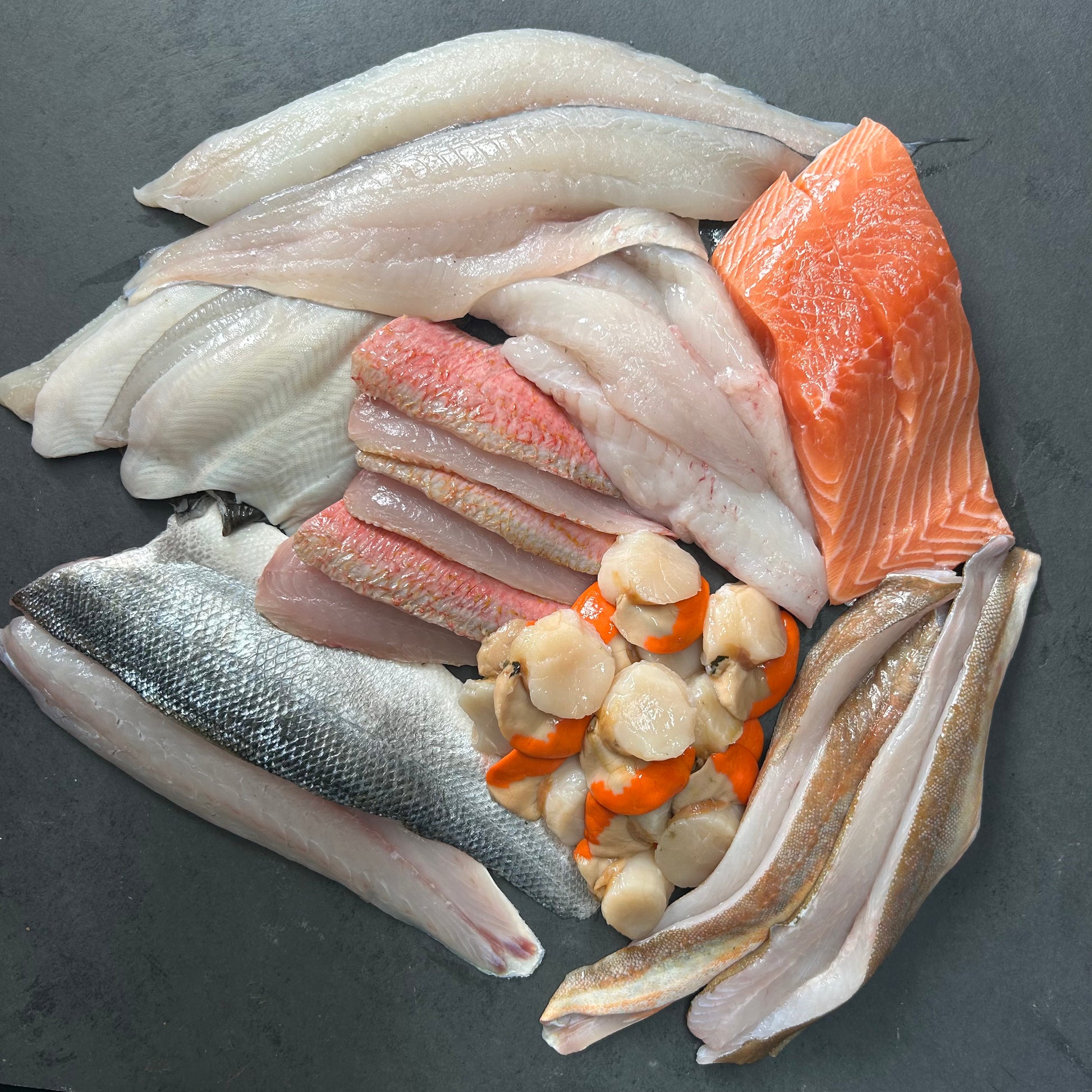 British Seafood Box – 16 Portions on a slate background, from Hamiltons Fish