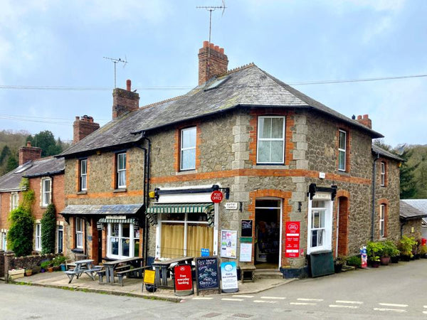 Traditional stone building with a street view in a village setting