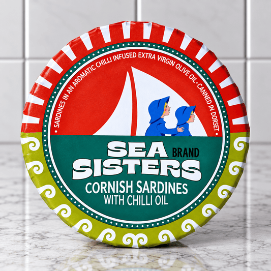 Cornish Sardines with Chilli Extra Virgin Olive Oil (120g) on a slate background, from Hamiltons Fish