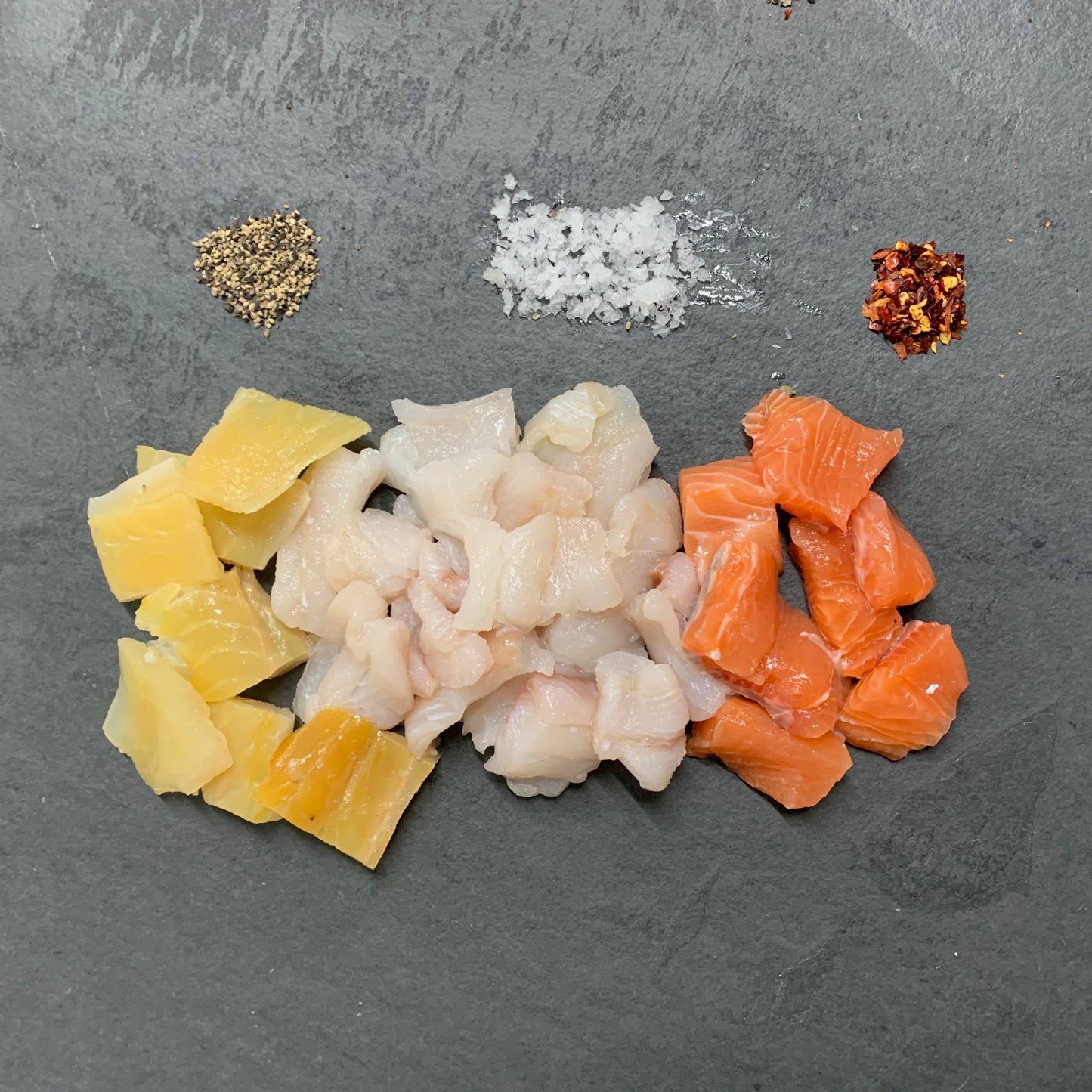 Finest Fish Pie Mix on a slate background, from Hamiltons Fish