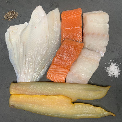 Fish of the Day Box – 4 Portions Per Person on a slate background, from Hamiltons Fish