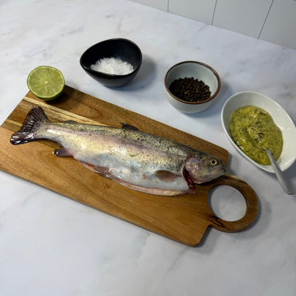 Fresh Farmed Rainbow Trout on a slate background, from Hamiltons Fish
