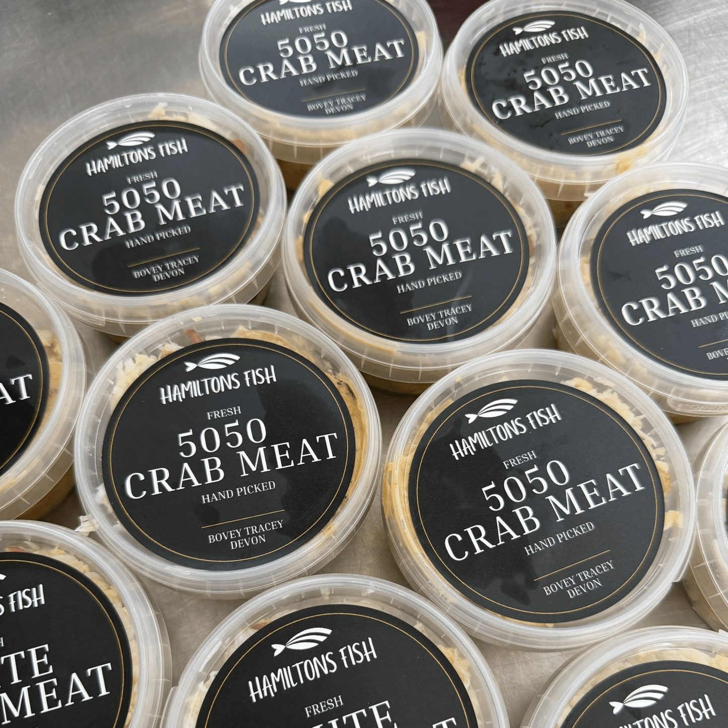 Fresh Handpicked 50/50 Crabmeat on a slate background, from Hamiltons Fish