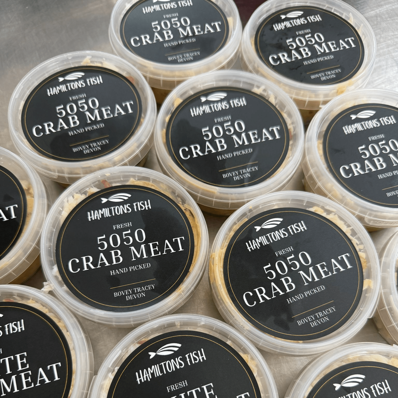 Fresh Handpicked 50/50 Crabmeat on a slate background, from Hamiltons Fish