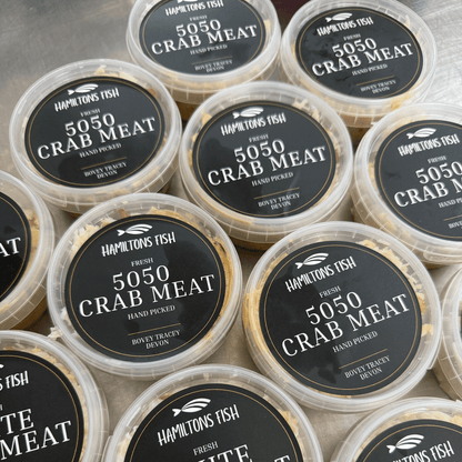 Fresh Handpicked 50/50 Crabmeat on a slate background, from Hamiltons Fish