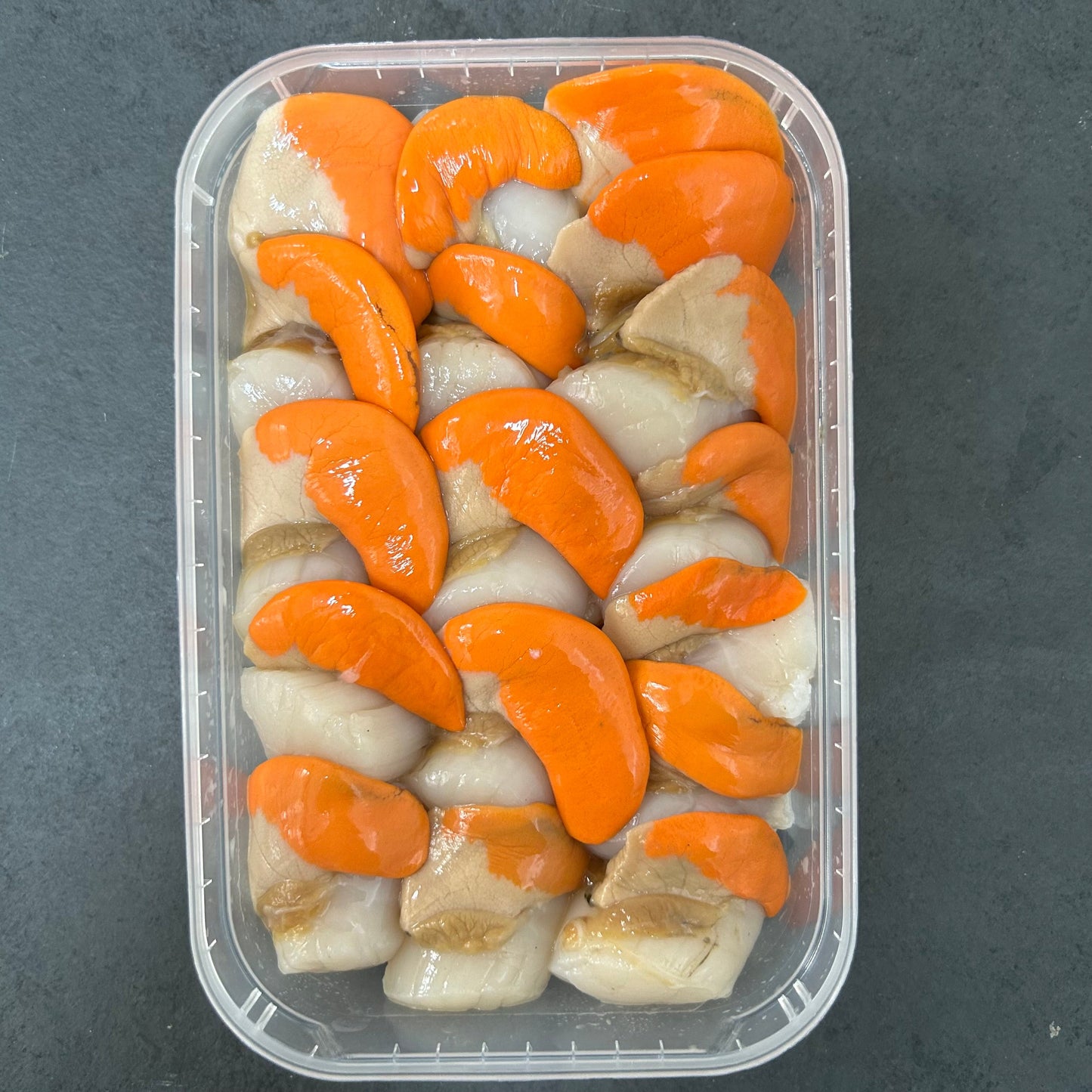 Fresh Scallops (500g) on a slate background, from Hamiltons Fish