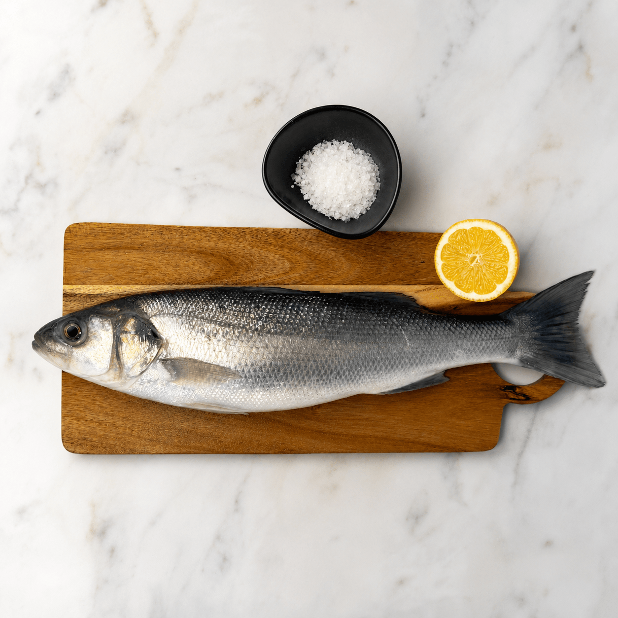 Fresh Wild Bass on a slate background, from Hamiltons Fish