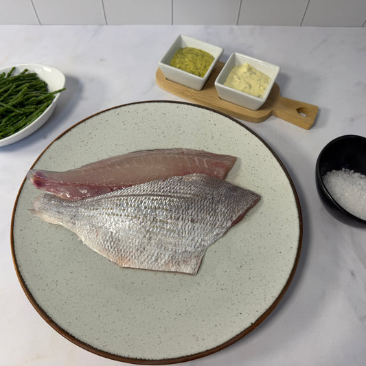 Fresh Wild Black Bream Fillets on a slate background, from Hamiltons Fish