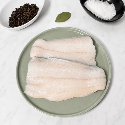 Fresh Wild Haddock Fillets on a slate background, from Hamiltons Fish
