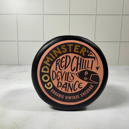 Godminster Red Chilli Devil’s Dance Cheddar (200g) on a slate background, from Hamiltons Fish