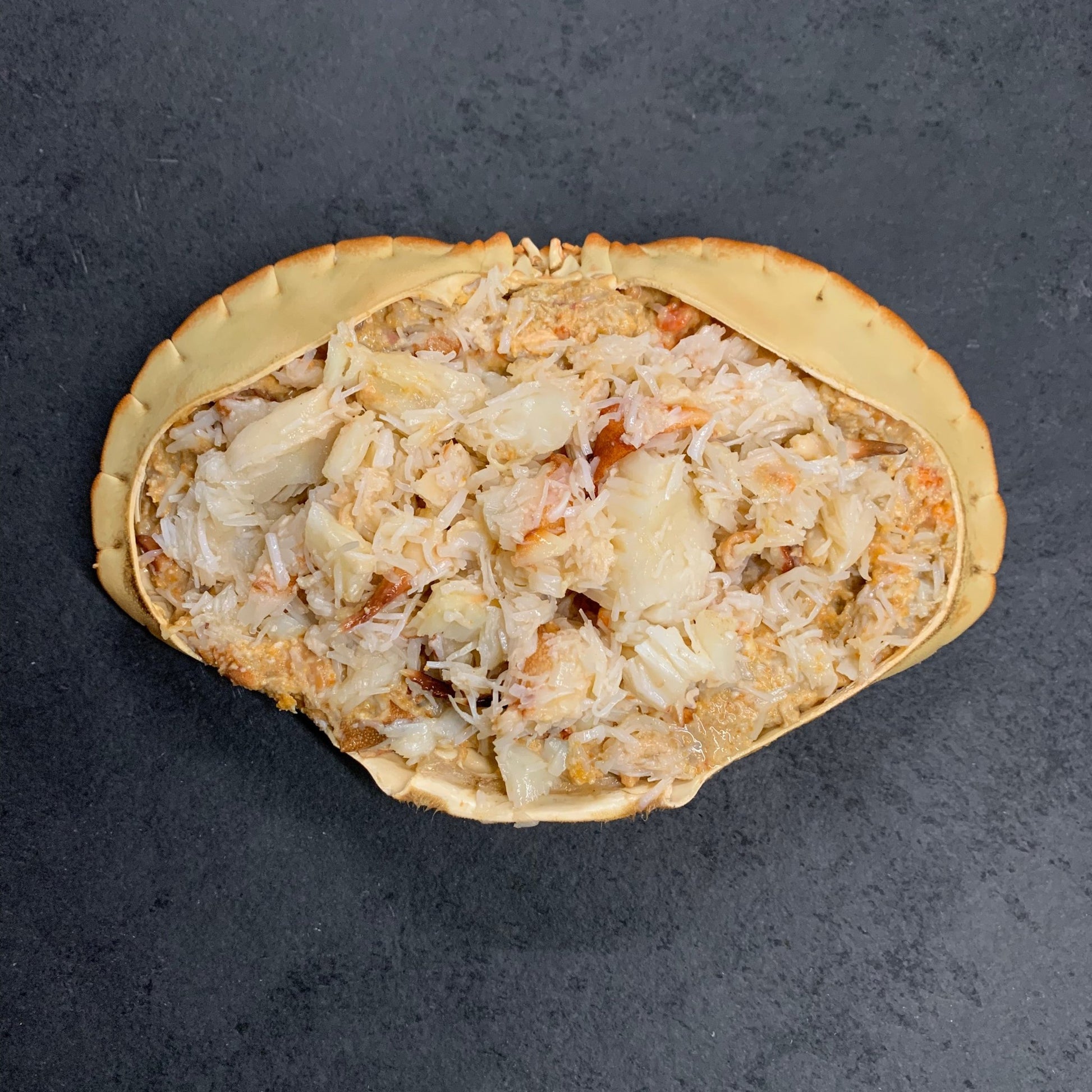 Handpicked Dressed Crab on a slate background, from Hamiltons Fish