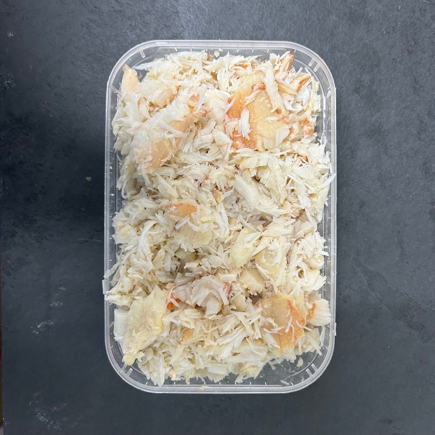 Handpicked White Crabmeat on a slate background, from Hamiltons Fish
