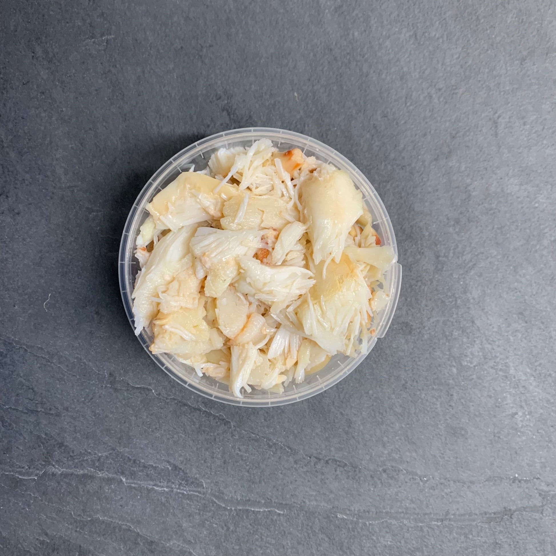 Handpicked White Crabmeat on a slate background, from Hamiltons Fish