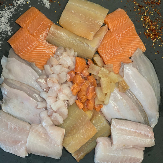 Mixed Fish Box – 20 Portions on a slate background, from Hamiltons Fish