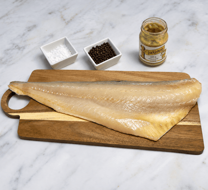Natural Smoked Haddock Fillets on a slate background, from Hamiltons Fish