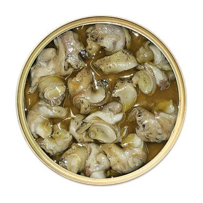 Norfolk Whelks with Chilli and Garlic (110g) on a slate background, from Hamiltons Fish