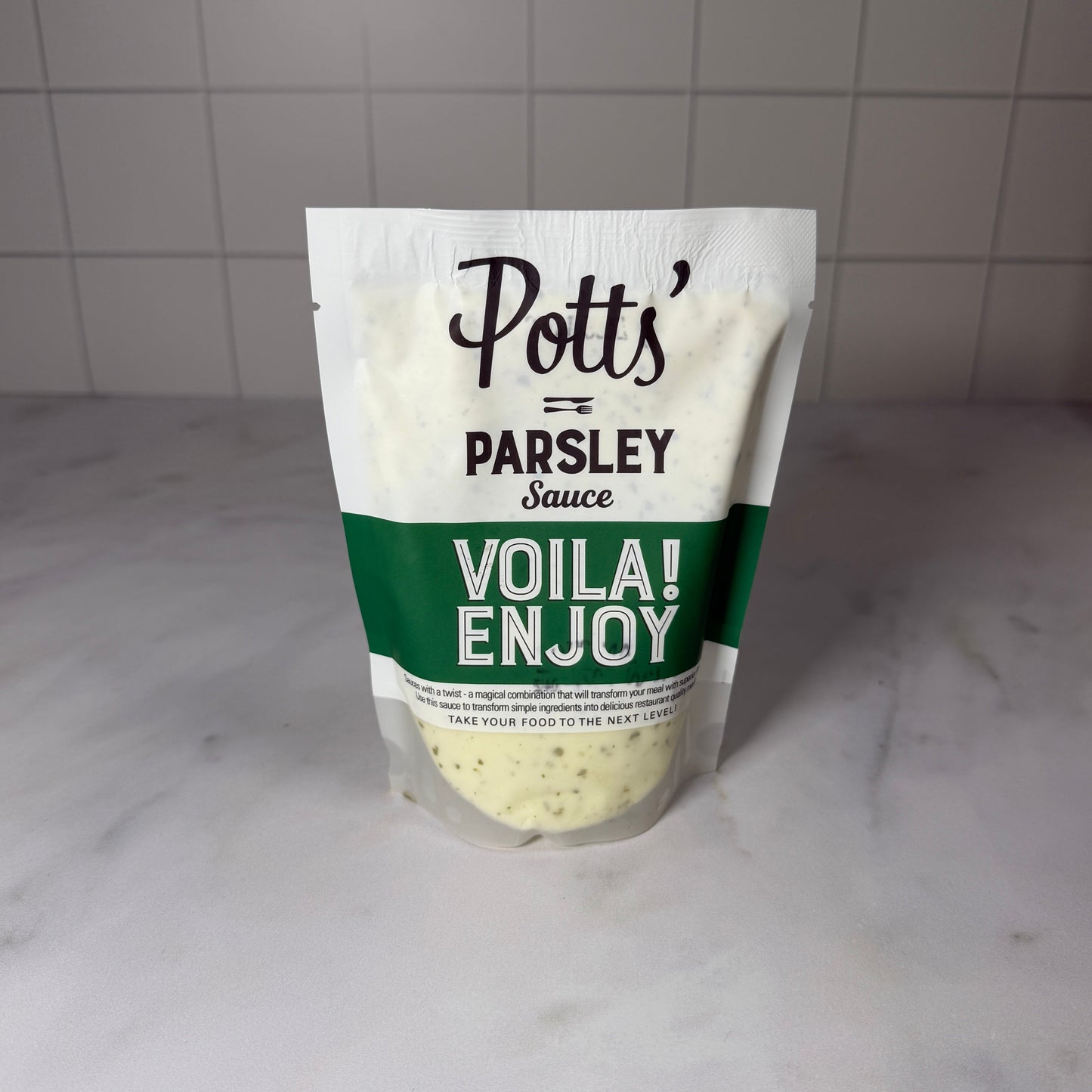Parsley Sauce (250g) on a slate background, from Hamiltons Fish