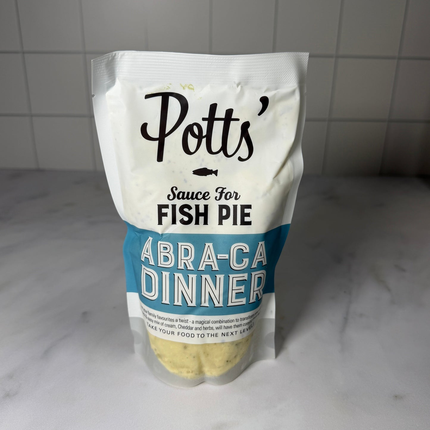 Sauce for Fish Pie (400g) on a slate background, from Hamiltons Fish