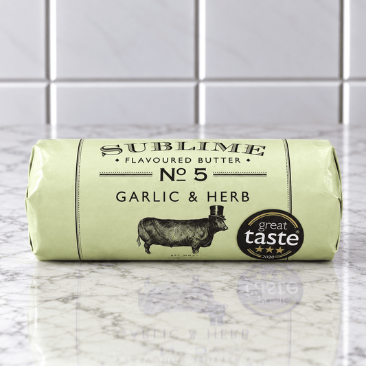 Sublime No. 5 Garlic and Herb Butter (90g) on a slate background, from Hamiltons Fish