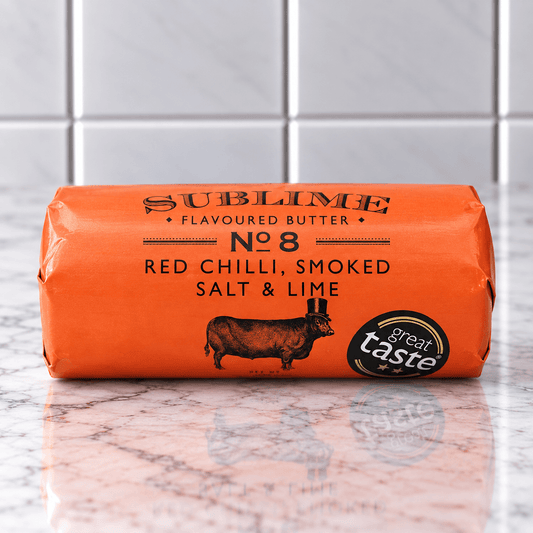 Sublime No. 8 Red Chilli, Smoked Salt & Lime Butter (90g) on a slate background, from Hamiltons Fish