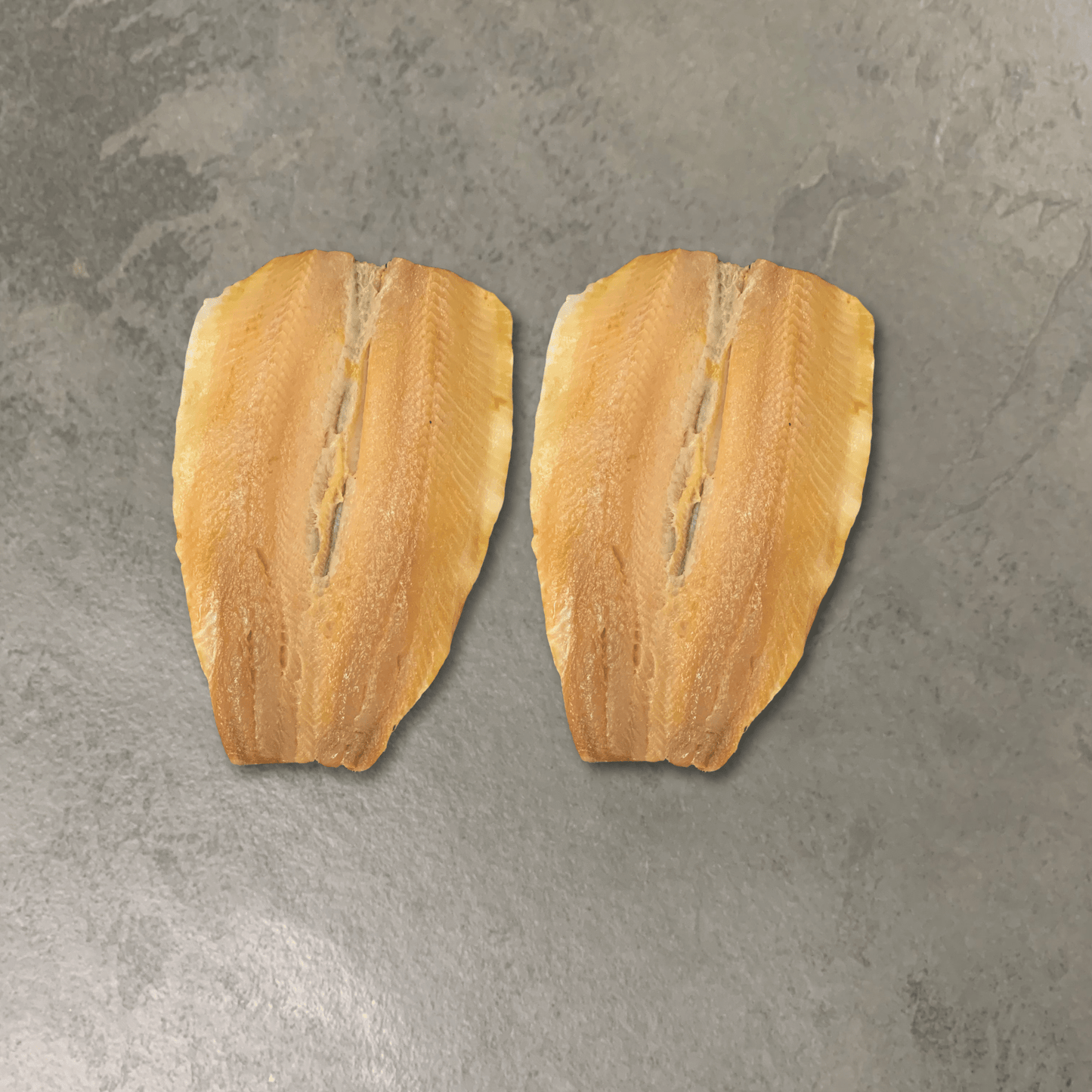Traditional Kipper Fillets on a slate background, from Hamiltons Fish