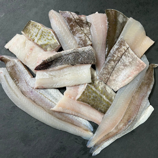 White Fish Box – 16 Portions on a slate background, from Hamiltons Fish
