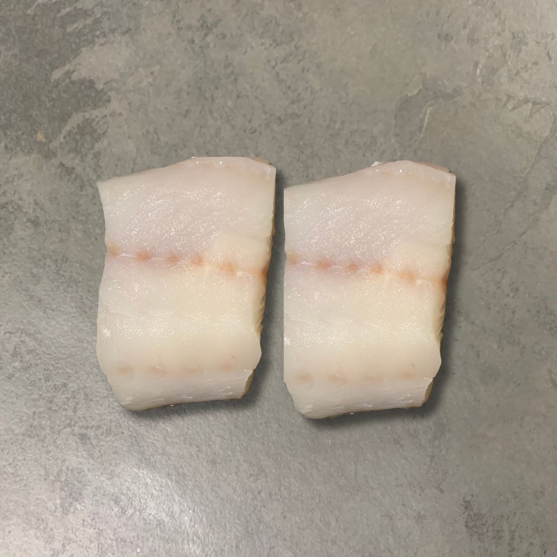 Wild Cod Fillets on a slate background, from Hamiltons Fish