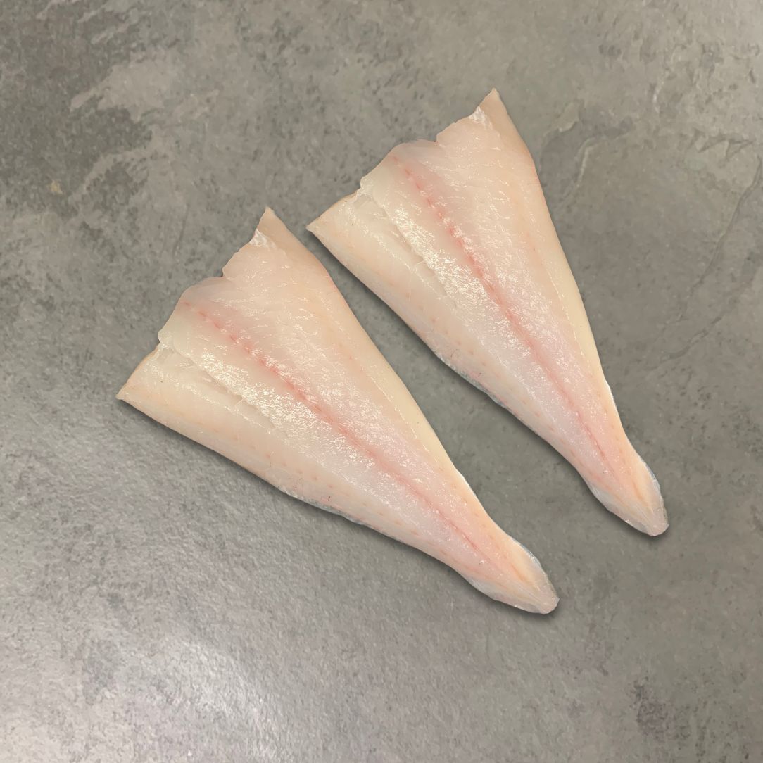 Wild Haddock Fillets on a slate background, from Hamiltons Fish