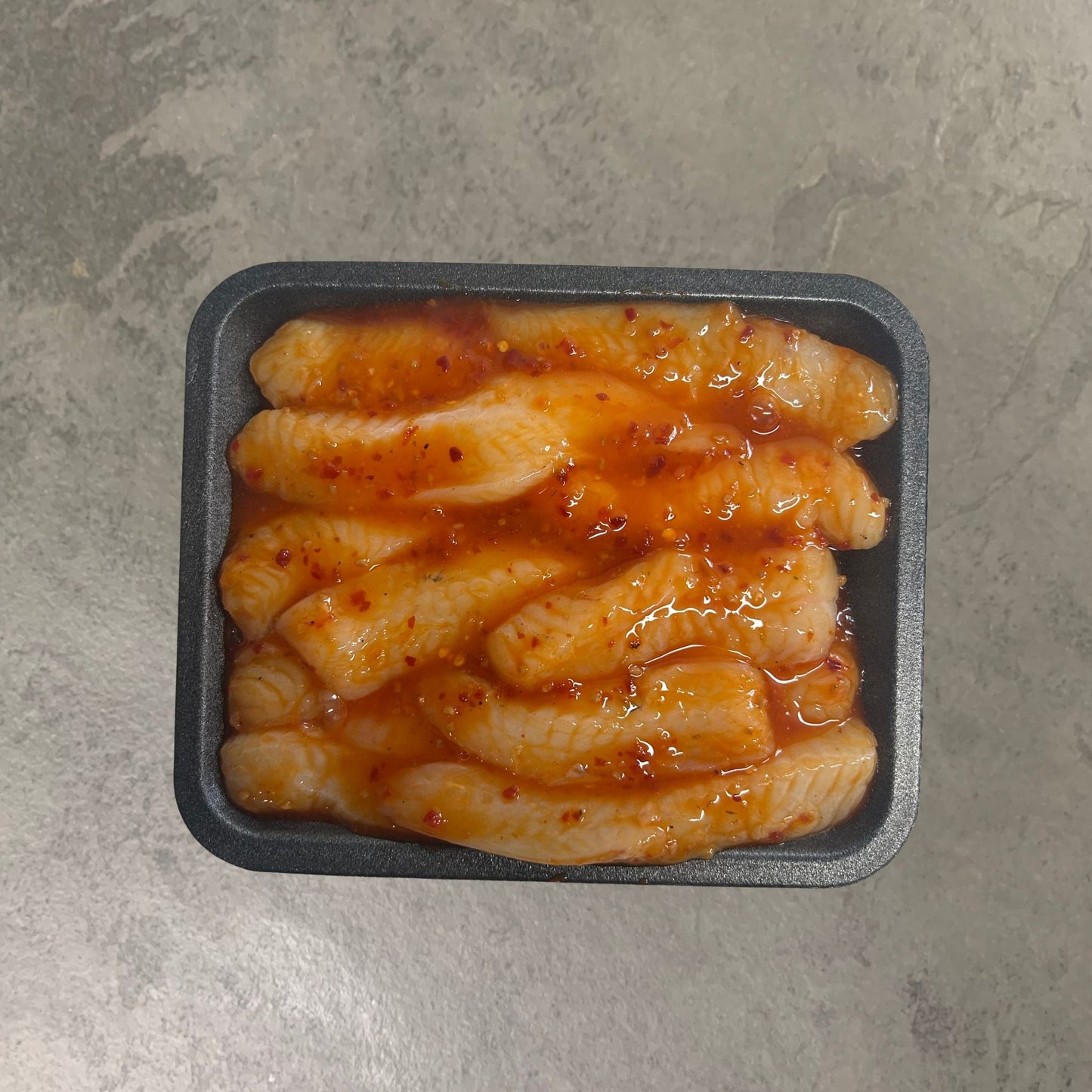 Wild Monkfish Goujons on a slate background, from Hamiltons Fish