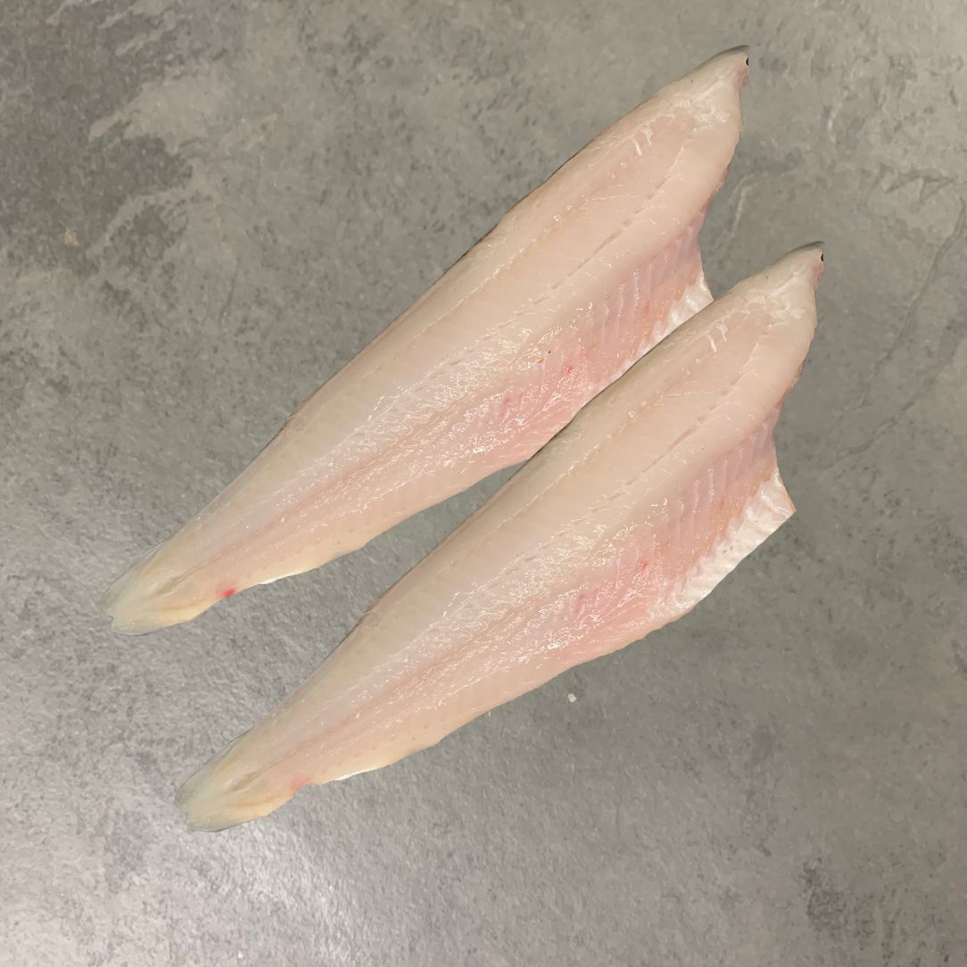 Wild Pollack Fillets on a slate background, from Hamiltons Fish