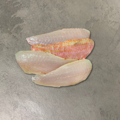 Wild Red Mullet Fillets on a slate background, from Hamiltons Fish