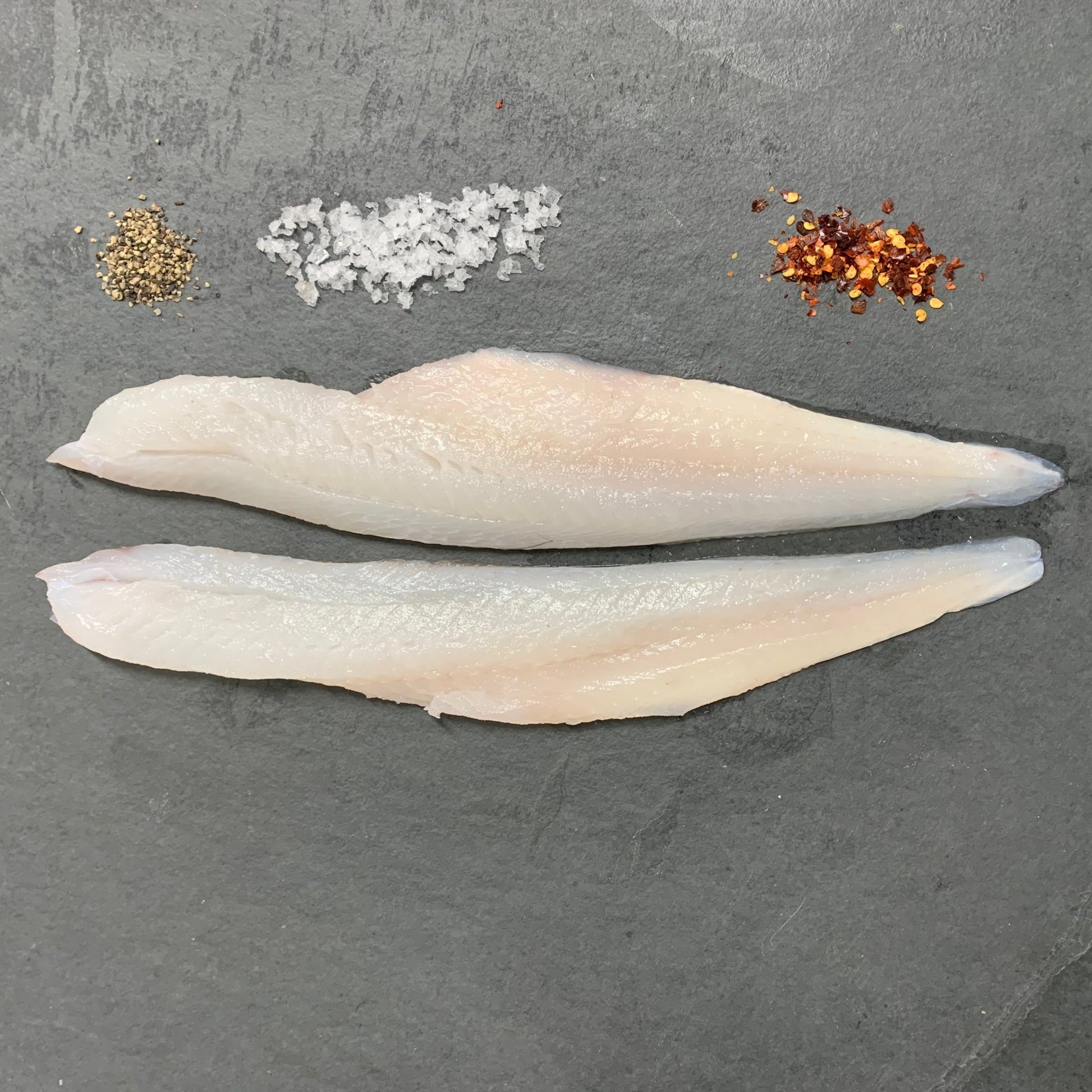Wild Whiting Fillets on a slate background, from Hamiltons Fish